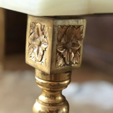 Coffee table in onyx and brass