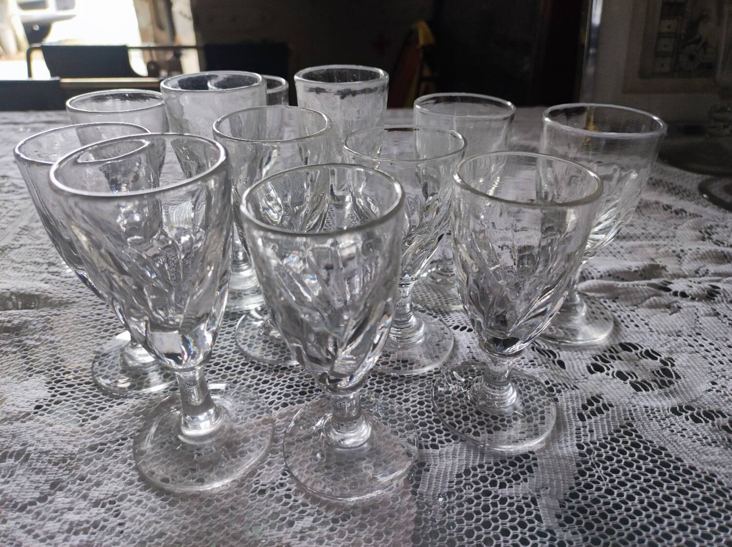 12 small twisted bistro glasses, 19th century