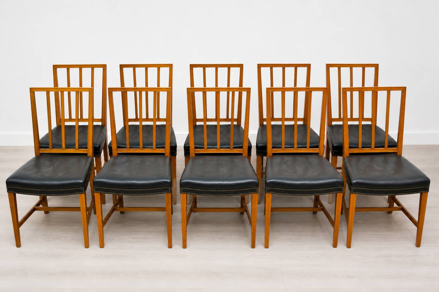 10 antique Josef Frank model 620 chairs in walnut wood from Svenskt Tenn.
