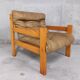 Vintage heater armchair in pine and leather 70s