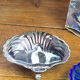 Shell-shaped butter dish in stainless steel and blue glass