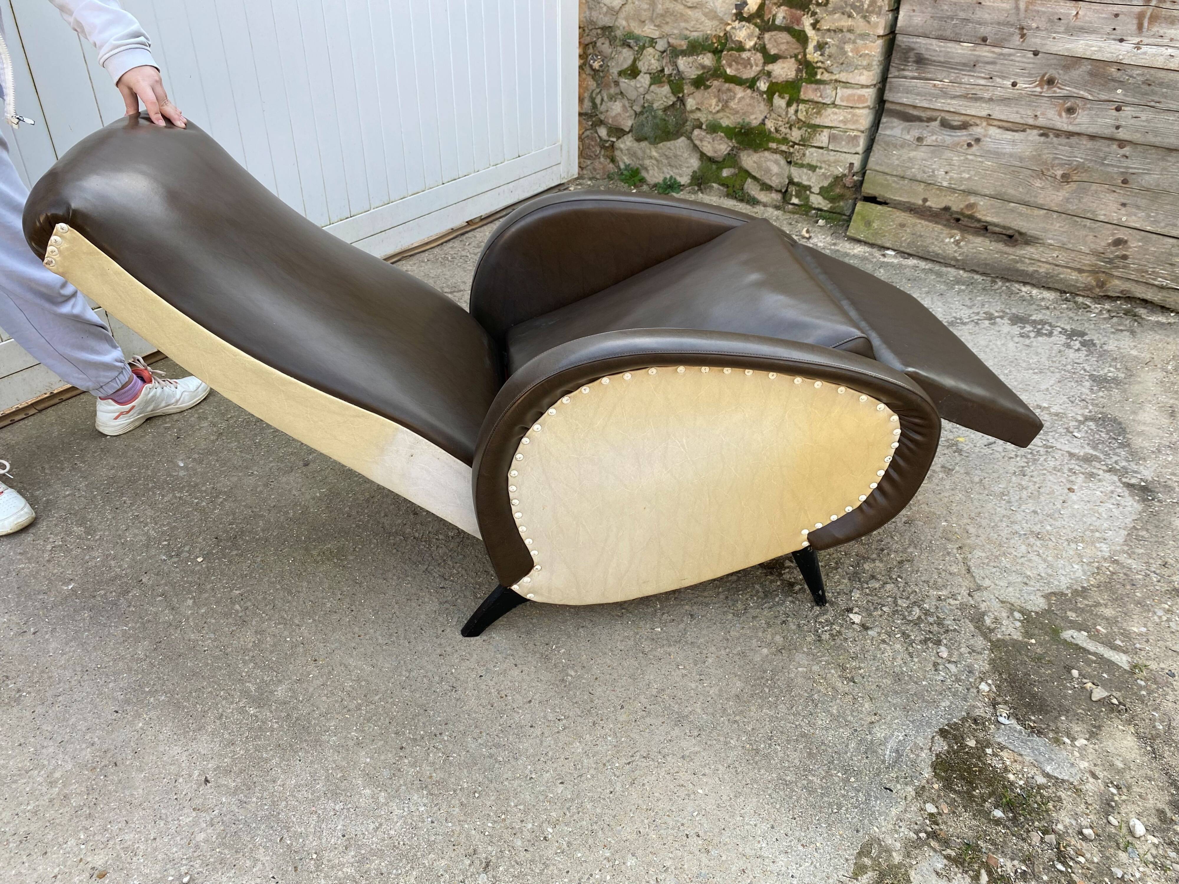 Vintage 50 faux leather reclining lounge chair with footrest
