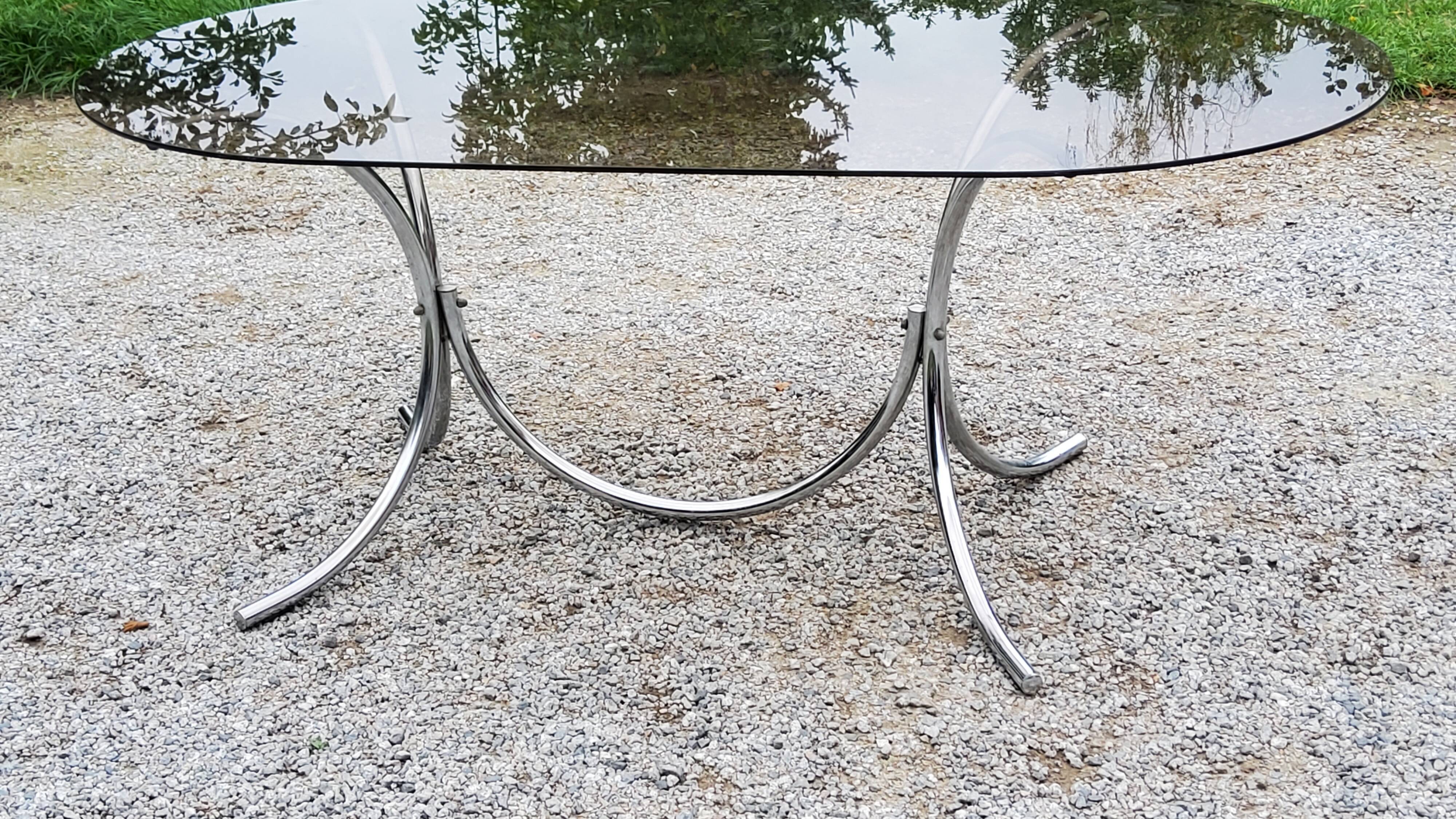 Dining table from the 70s top smoked glass base chrome