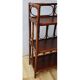 Dark rattan shelf