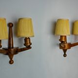 Pair of two-armed art deco wall lights, carved wood, France, 1960