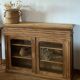 Old glass-fronted Parisian buffet in raw solid wood