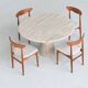 Large sculptural round dining table in cream white travertine, Italy, 1970.