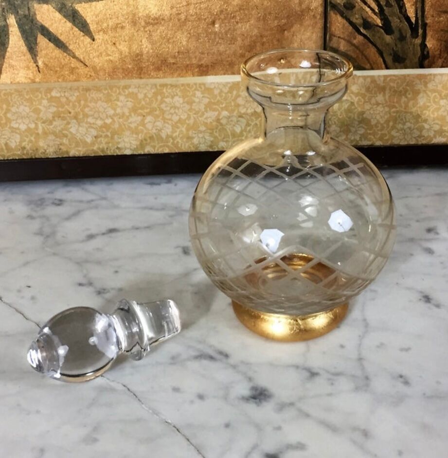 Carafe in chiseled and gilded glass, Circa 1940