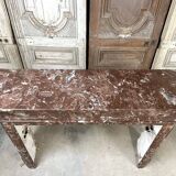 Red marble fireplace in the Louis XVI style, late 19th century