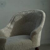 Antique Danish sculptural chaise longue from the 19th century, reupholstered in lambswool.