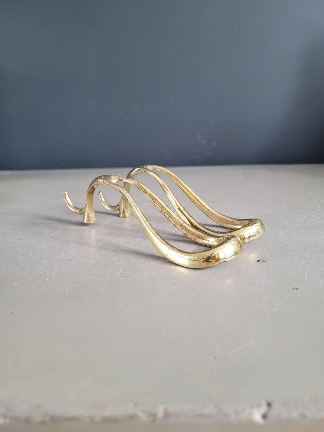 Antique brass pipe holder