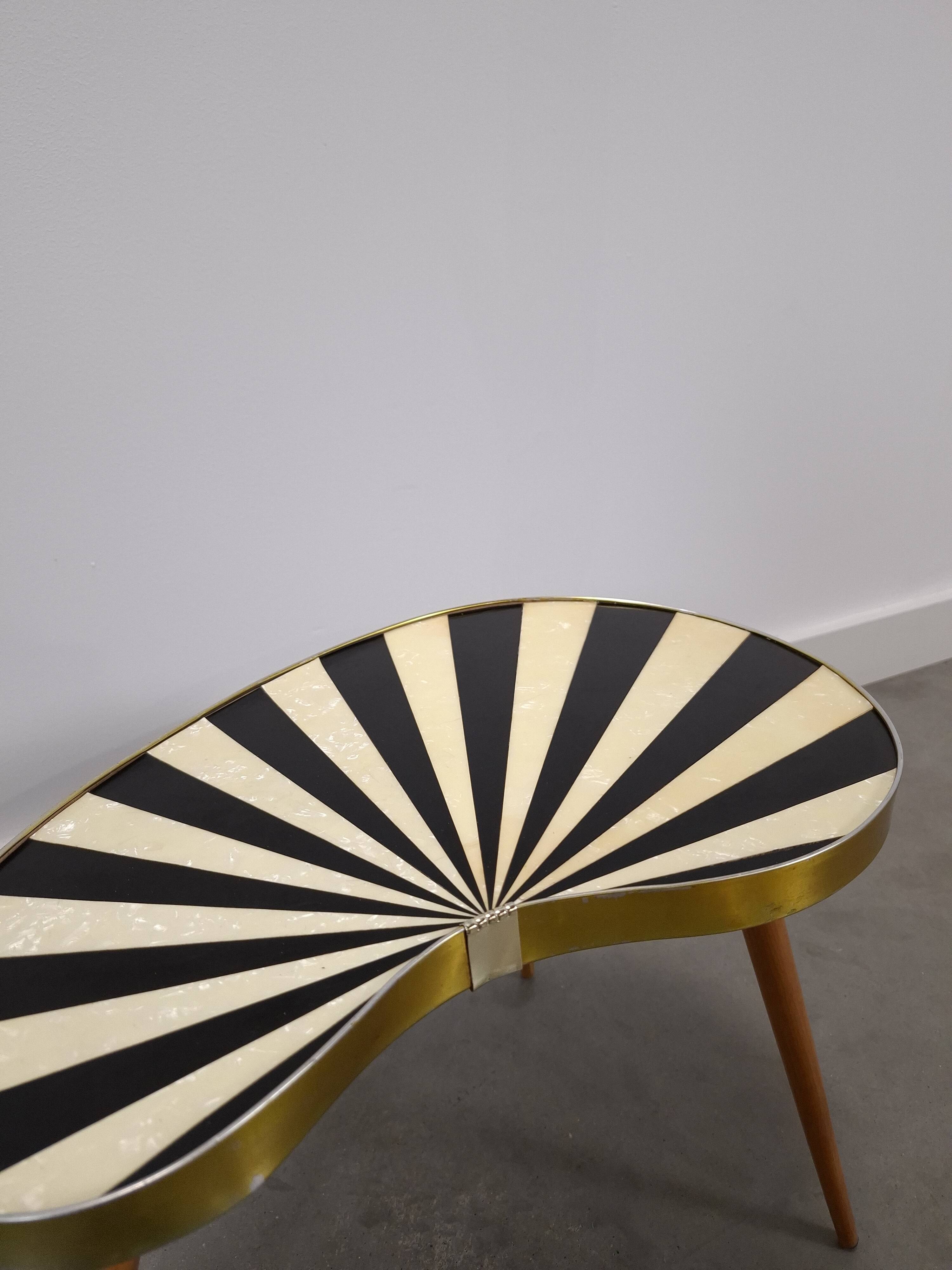 1950s kidney-shaped black and white table, plant table.