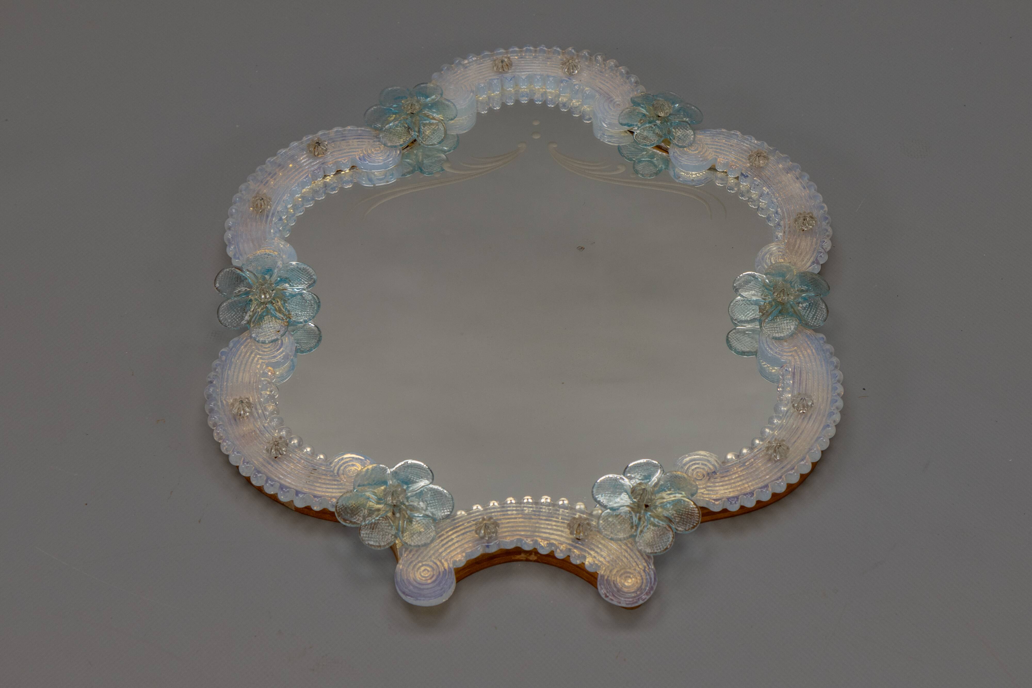 Italian Venetian Murano light blue and opalescent glass wall mirror, 1950s