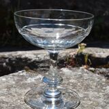 9 old champagne glasses in flat-waisted blown glass