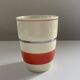 Red, white and silver porcelain jug set by Edmond Bellefroid for Robo.