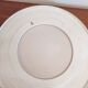 Large vintage round mirror with a white border.