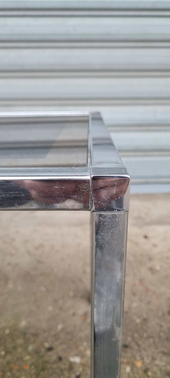 Pair of side tables in chrome metal and glass