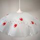White opaline glass suspension with red and silver floral decoration.