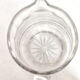 Hand-carved glass jug. France, 1950s.