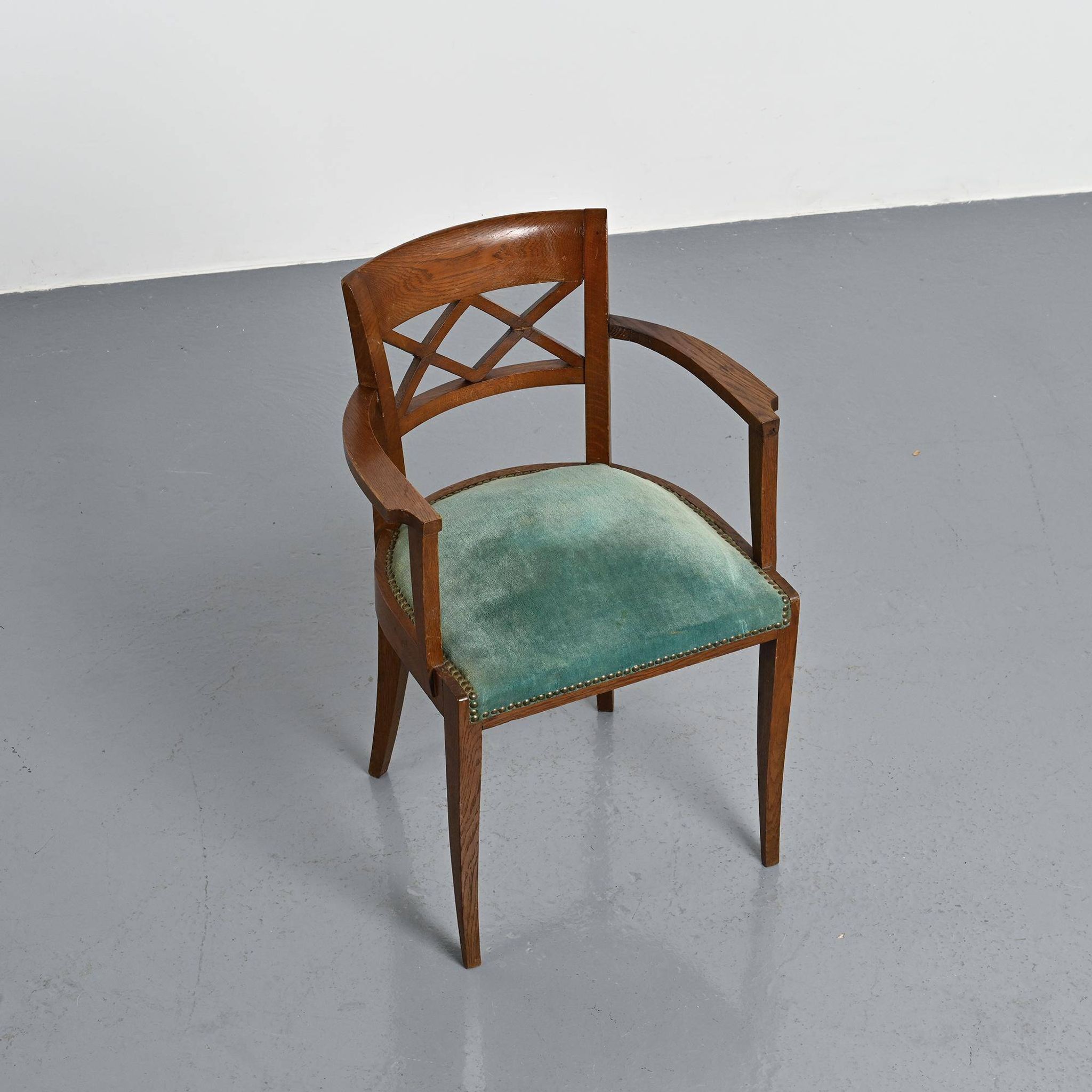 Set of four Art Deco armchairs in wood, France, circa 1940.