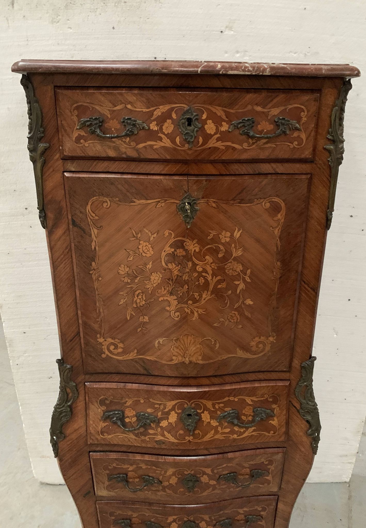 Louis XV style lady's secretary in light wood marquetry, 20th century.