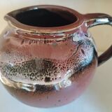 Stoneware pitcher by Matthieu Liévois in shades of red