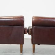 Set of 2 design armchairs made of sheepskin