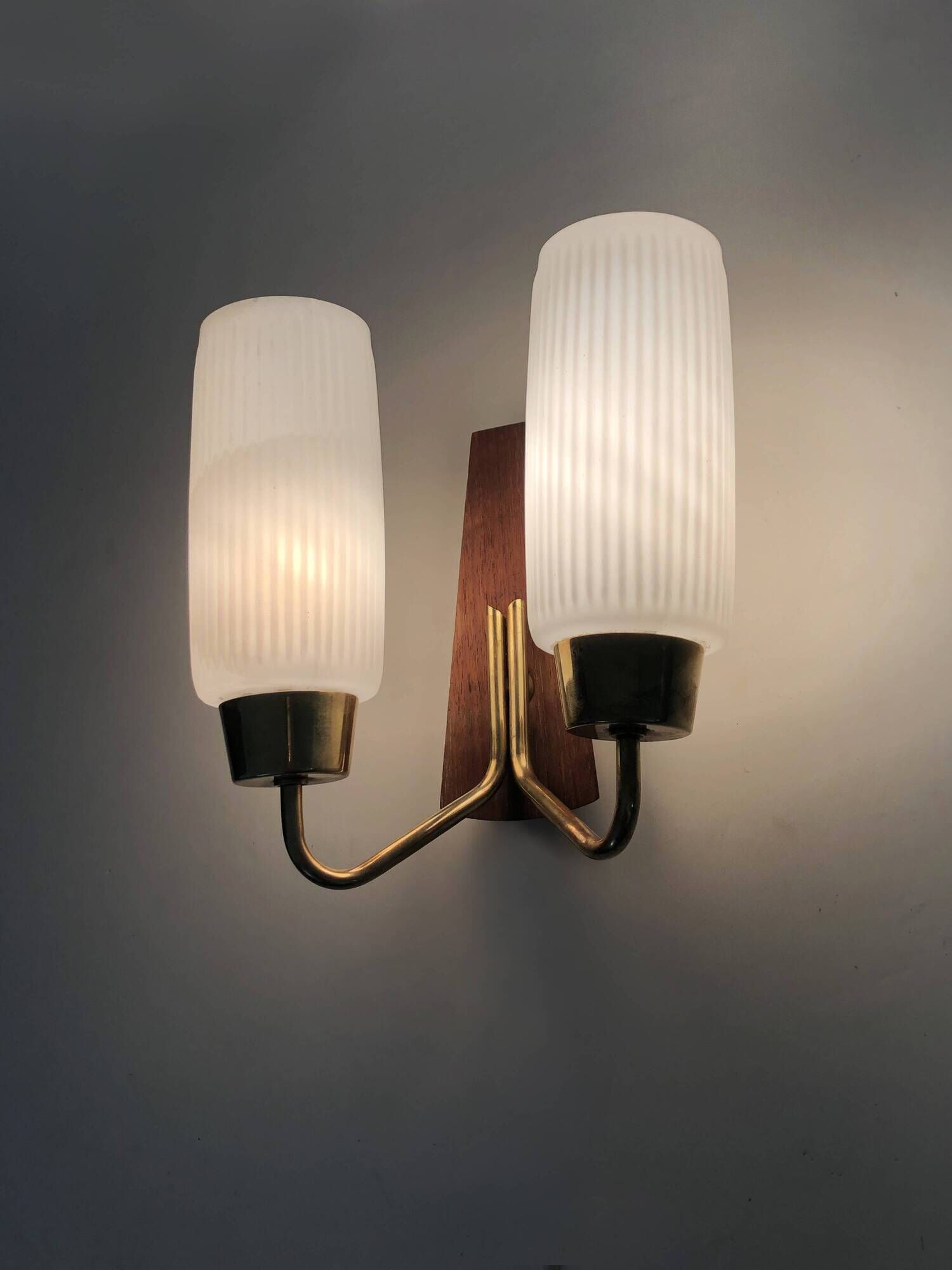Pair of Scandinavian wall sconces in teak, brass and opaline glass globe