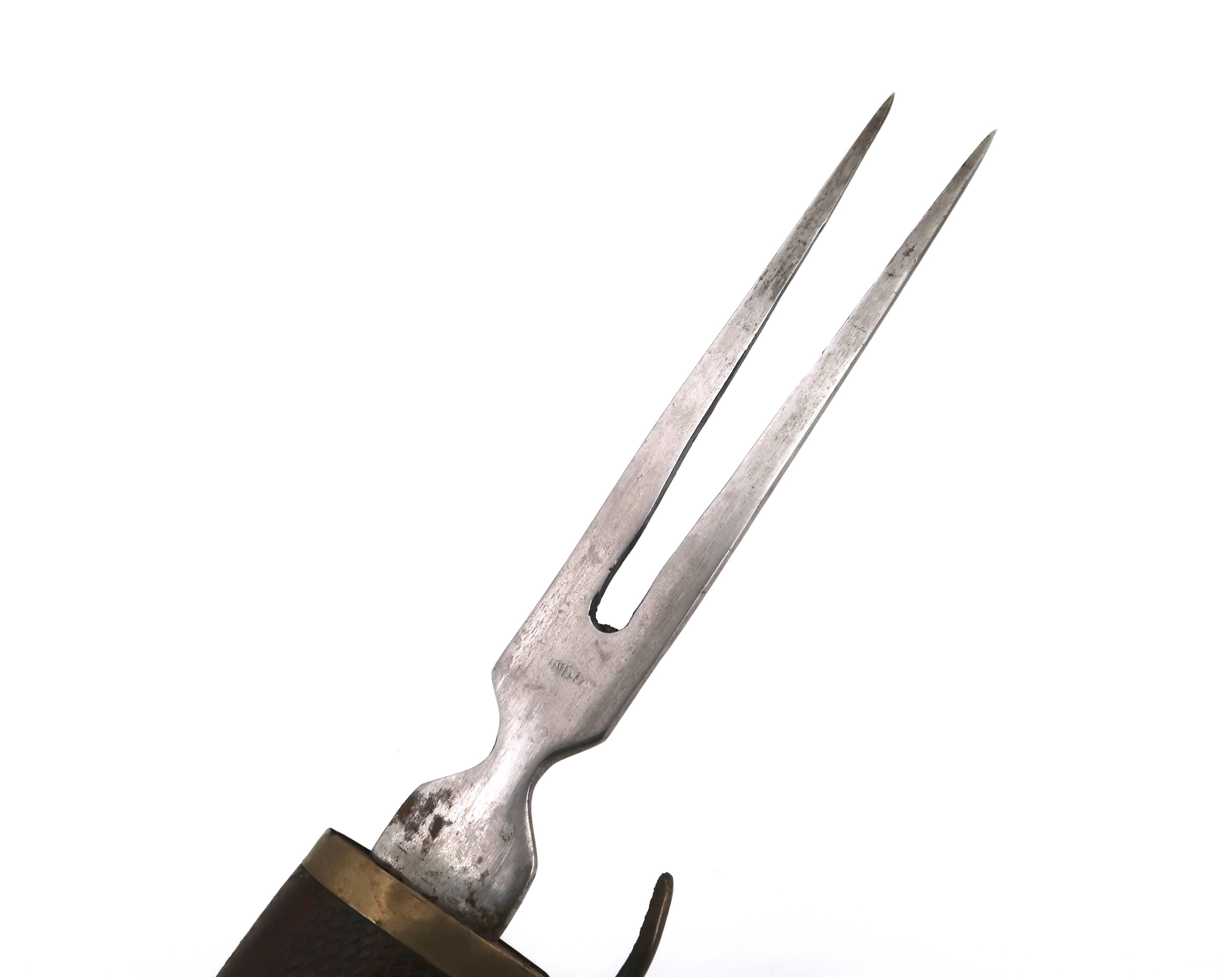 Fish knife and fork with a wooden and brass sheath sculpture.