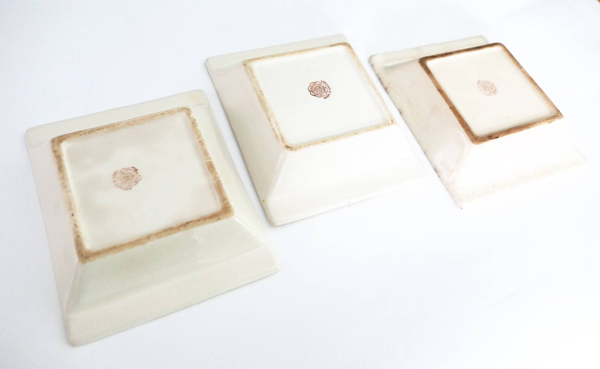 Set of three German ceramic catchalls from the 1950s.