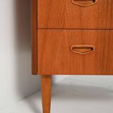 Scandinavian teak chest of drawers with sculpted recessed pulls