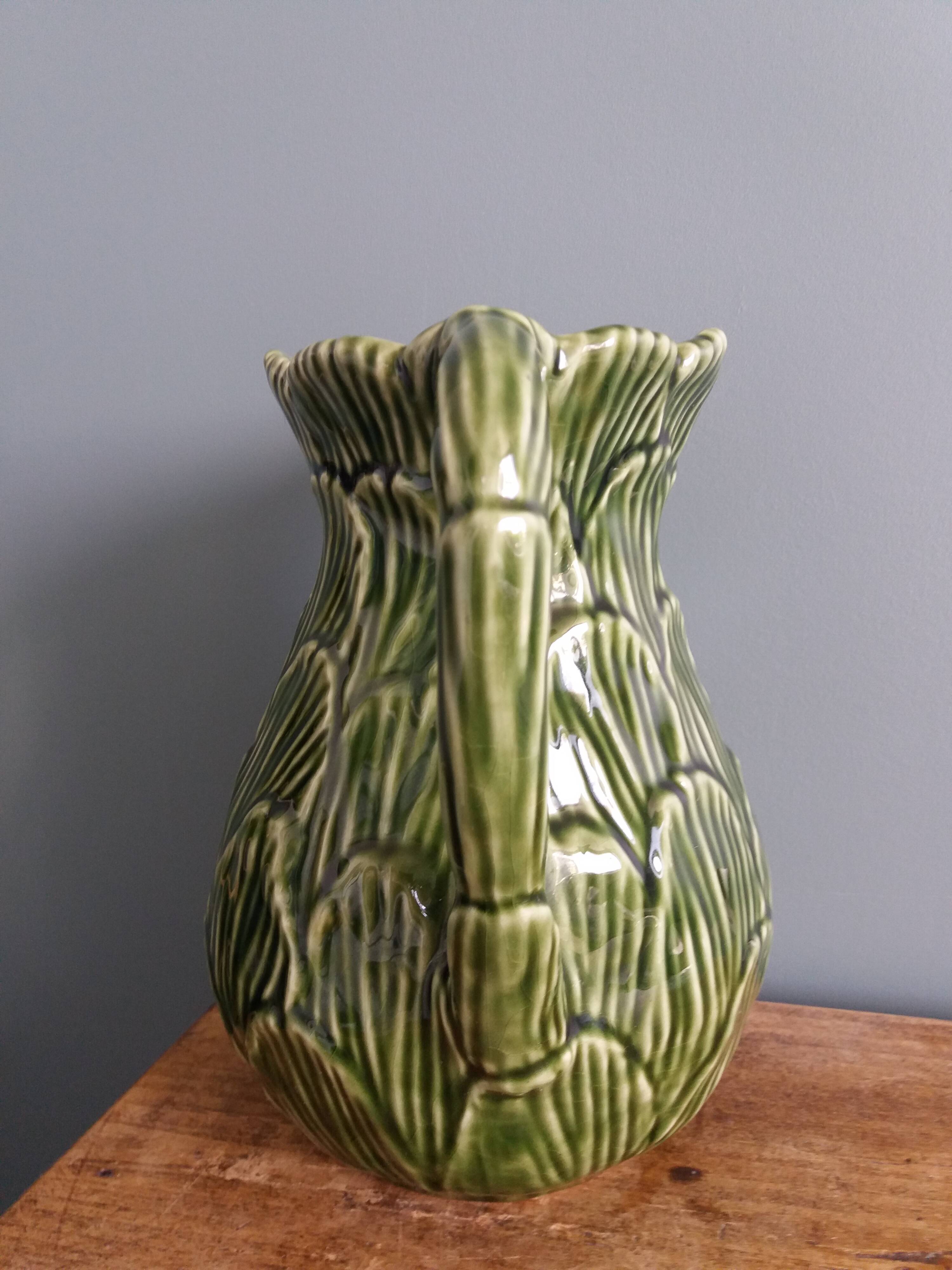 Cabbage pitcher in slip