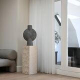Column, limestone sheath, contemporary work.
