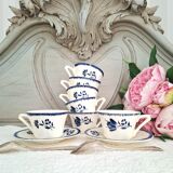 Antique cups with iron earthenware saucers