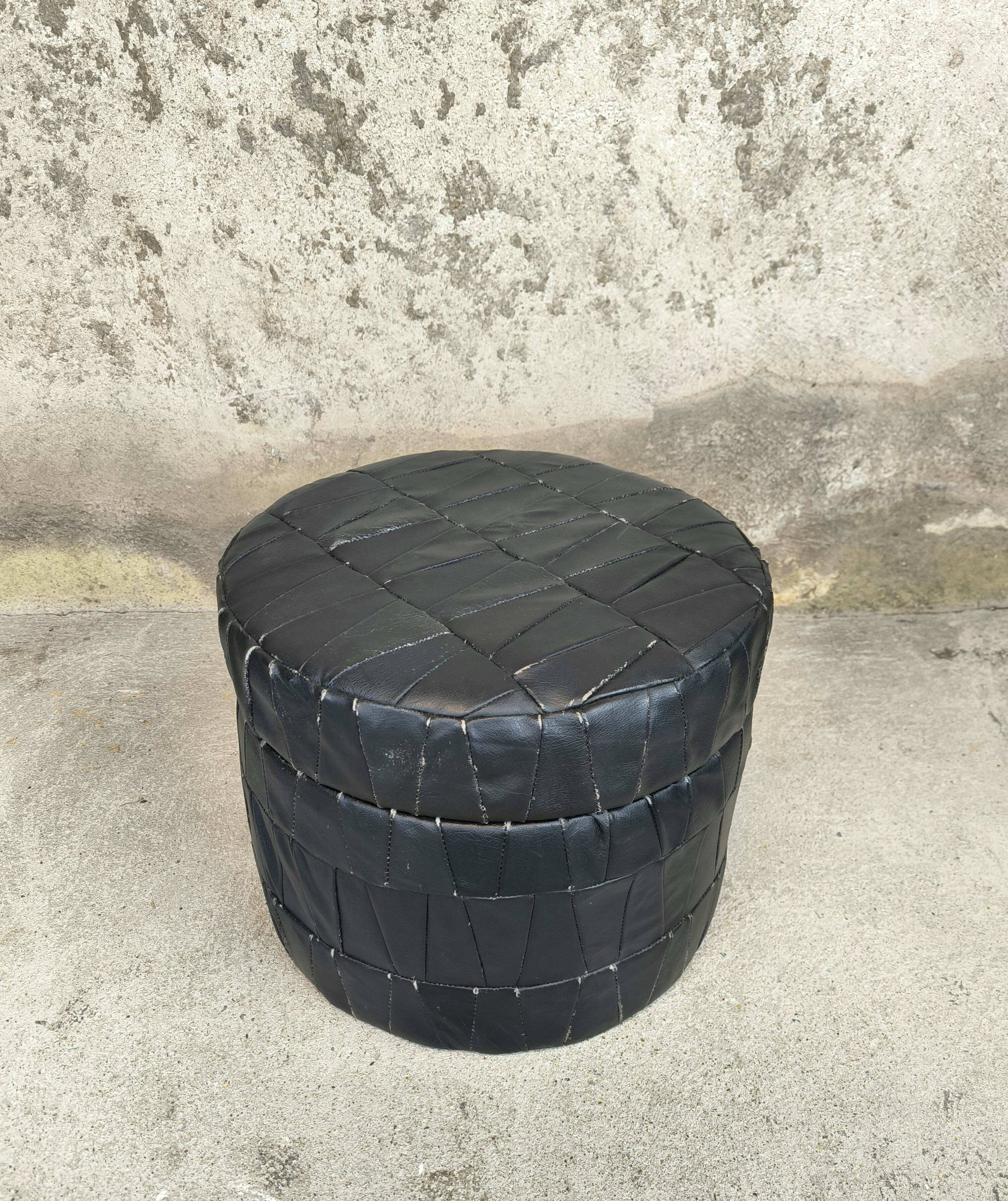 Vintage De Sede black leather storage pouf.