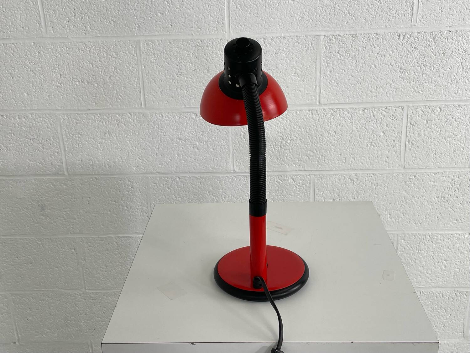 Red aluminor desk lamp from the 70s