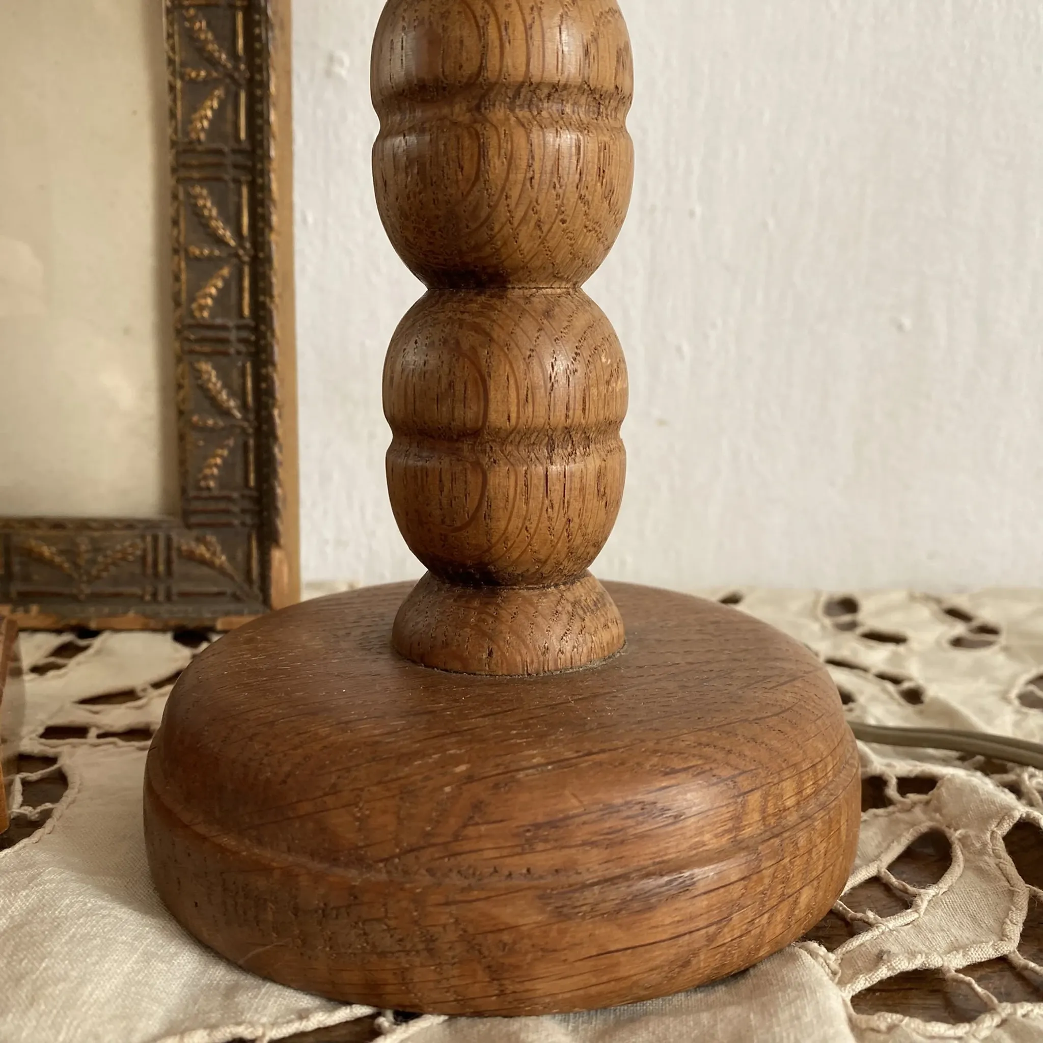 Wooden turned bedside lamp with lace
