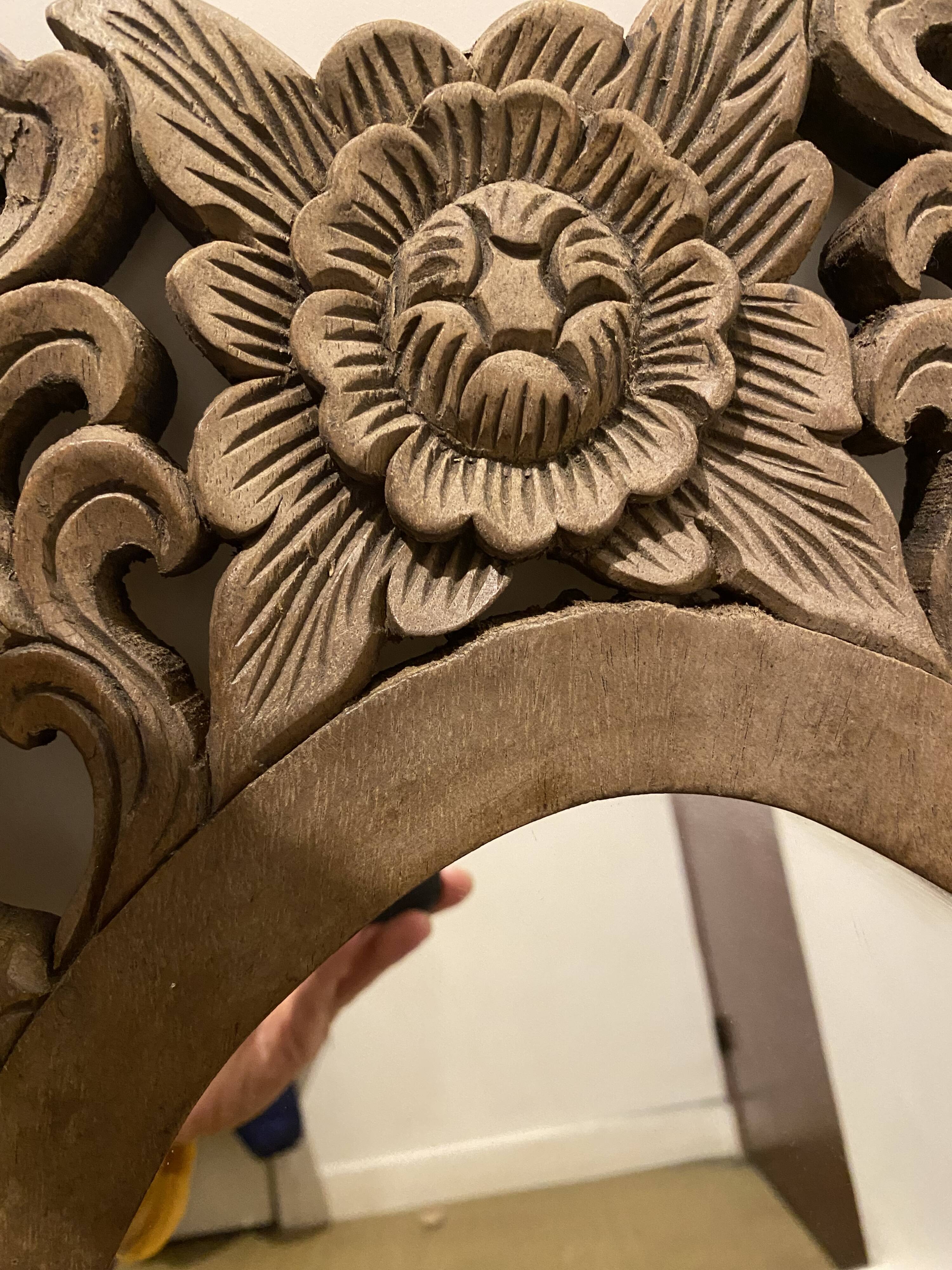 Carved mirror with integrated shelf