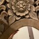 Carved mirror with integrated shelf