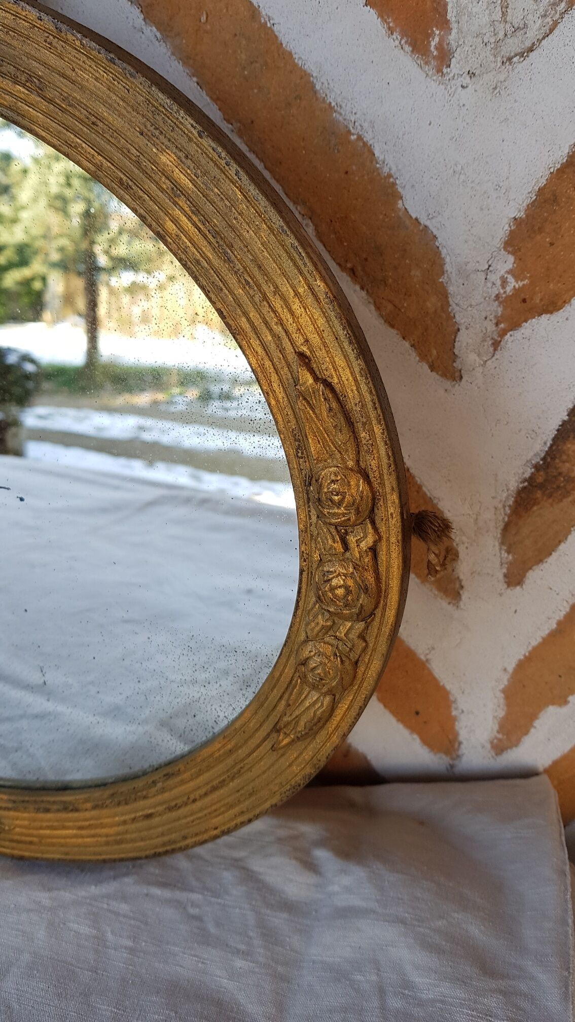 Art Deco golden oval mirror