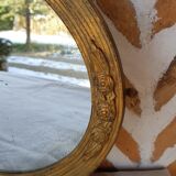 Art Deco golden oval mirror