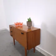 Vintage small teak cabinet with drawers, flap and black handles, hallway cabinet.