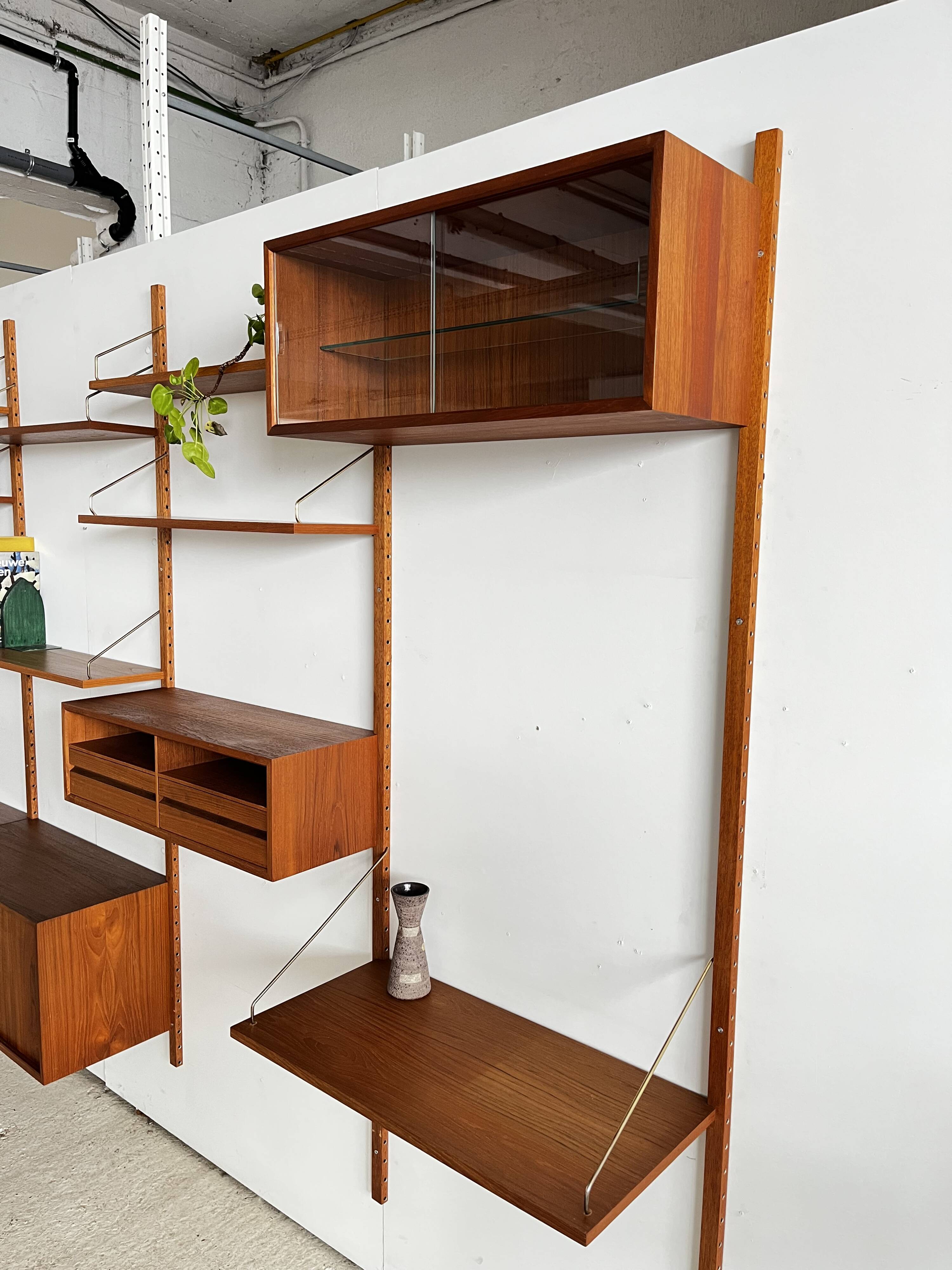 A wall unit with 4 compartments by Poul Cadovius, Denmark, 1960s.