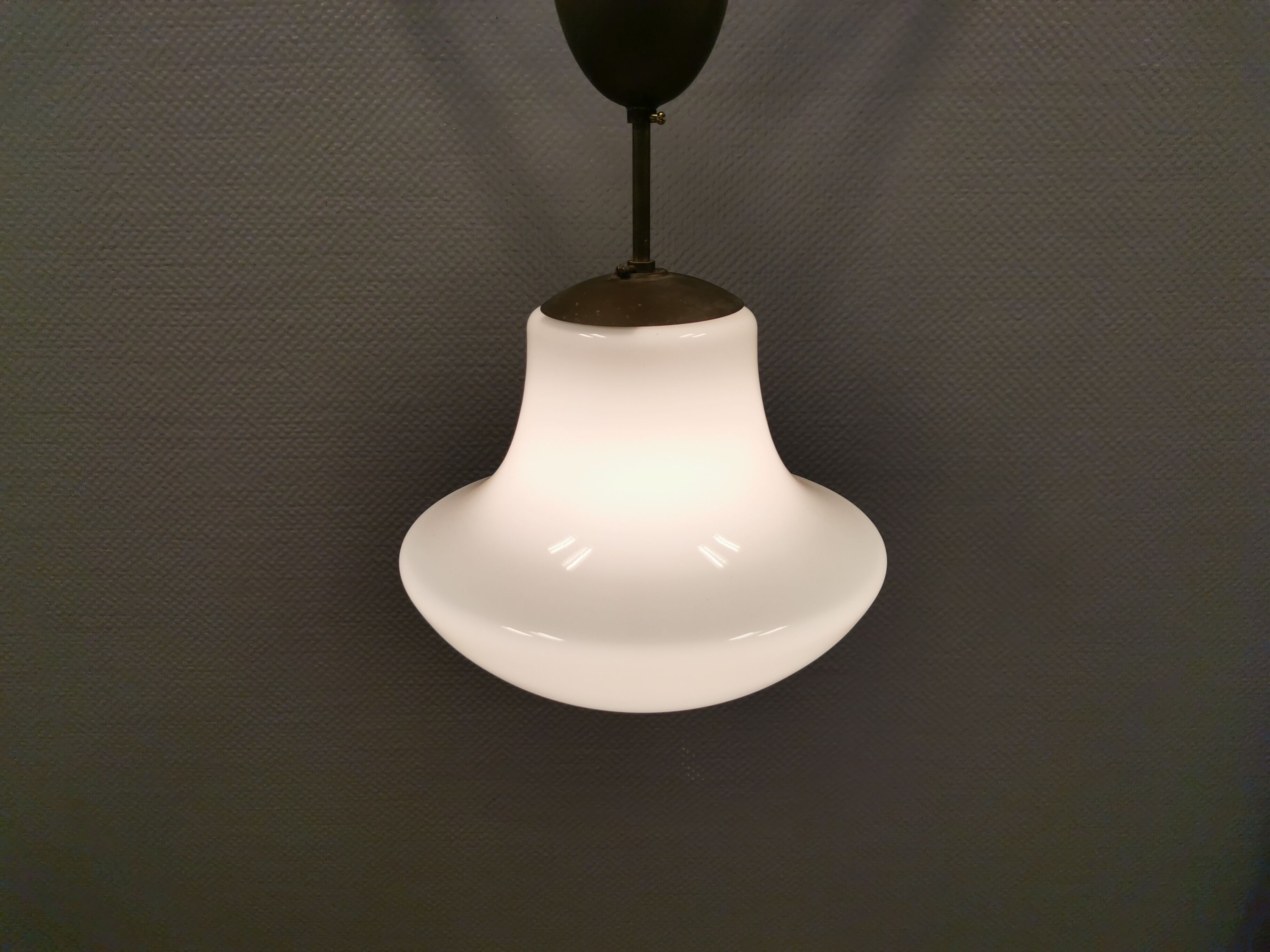 Older ceiling/hanging lamp in milky white opaline glass.