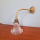 Bronze wall light with grooved clear glass, early 20th century