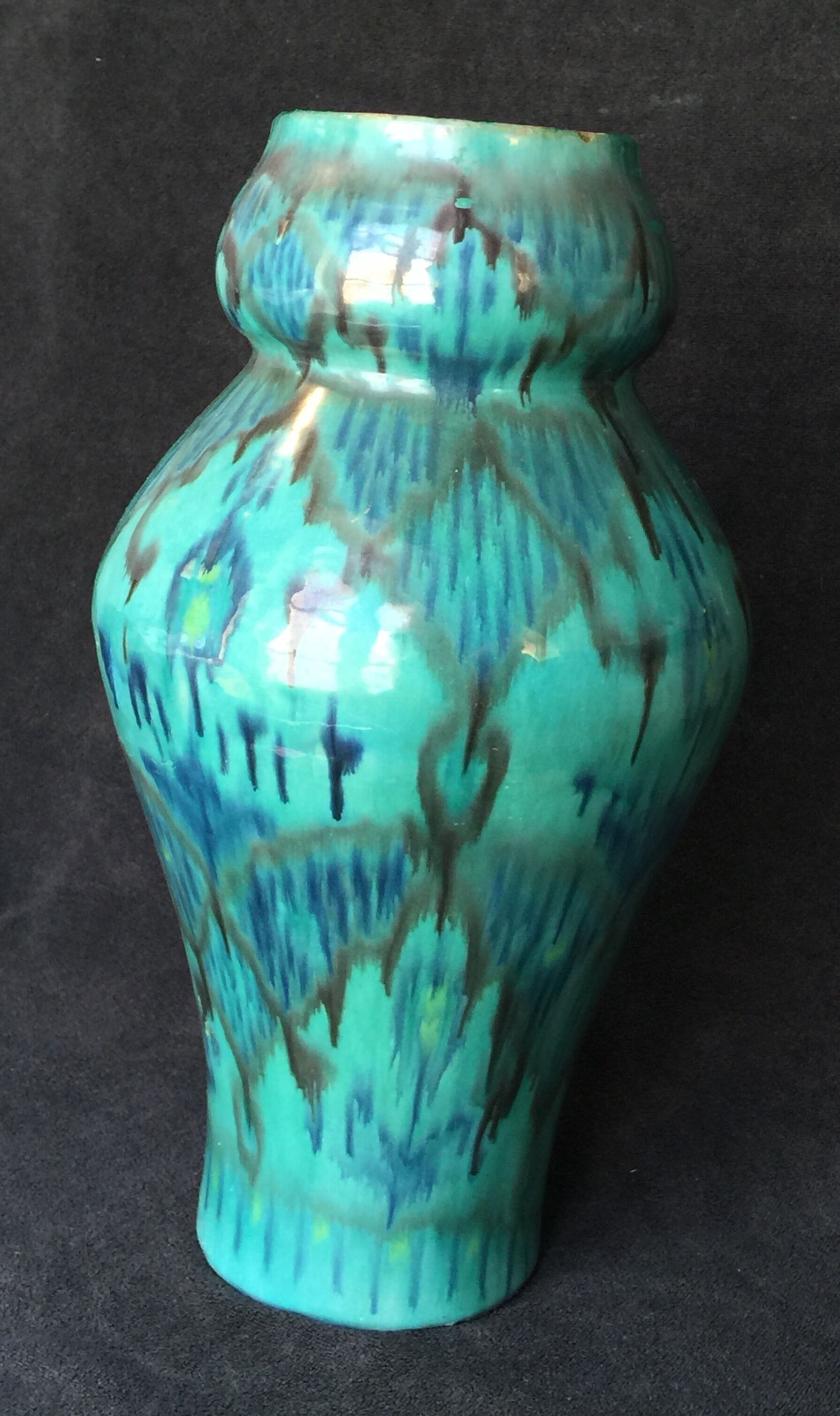 Enamelled ceramic vase, with a flaming blue-green décor