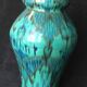 Enamelled ceramic vase, with a flaming blue-green décor