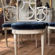 Set of 6 lyre chairs from the Napoleonic III period in painted wood in the Louis XVI style.