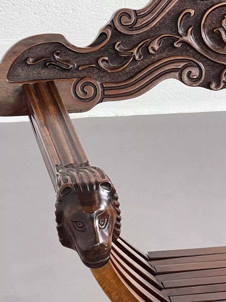 Vintage folding chair in carved wood