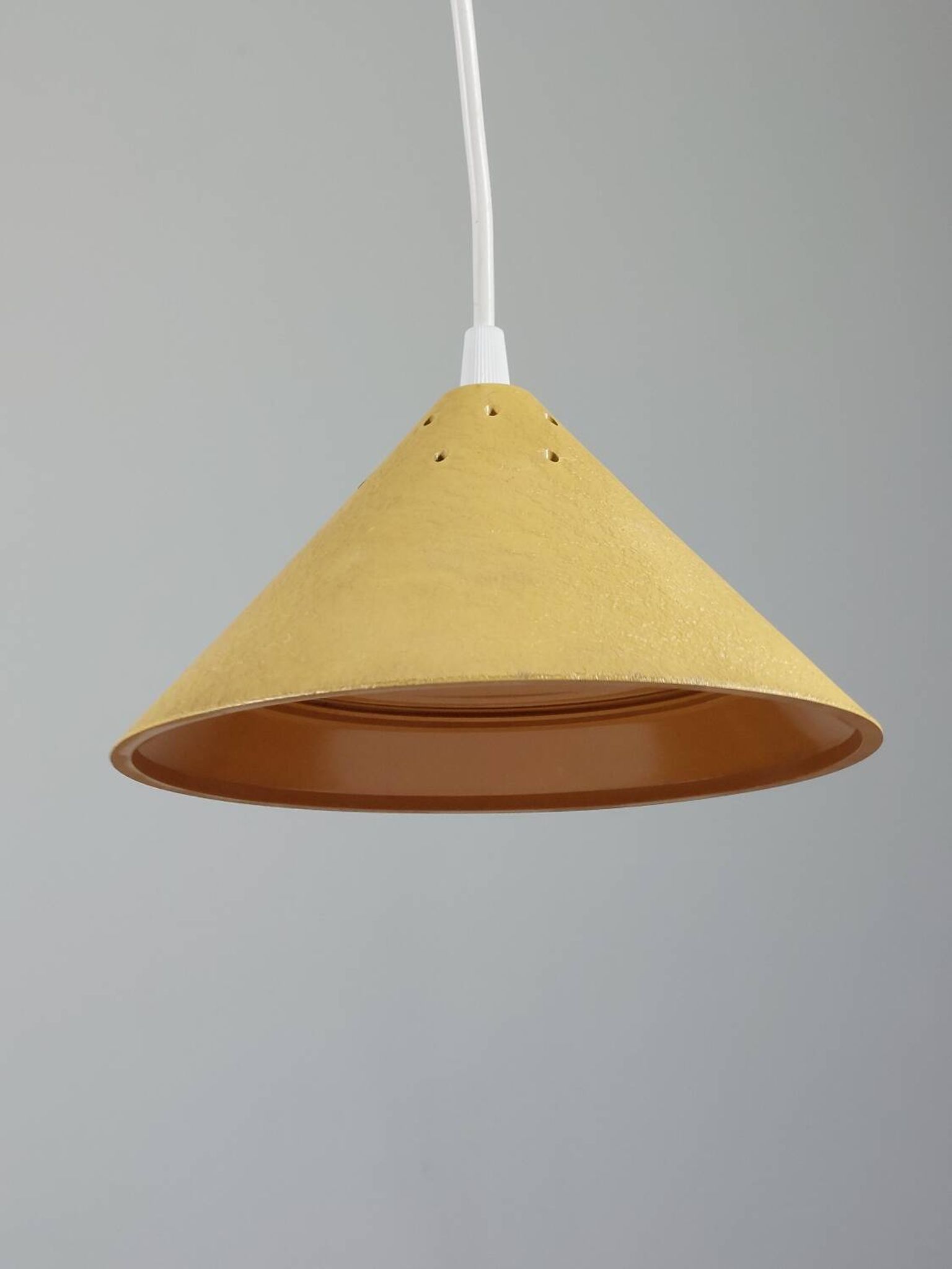 Vintage suspension in yellow lacquered Bakelite from the 1950s.